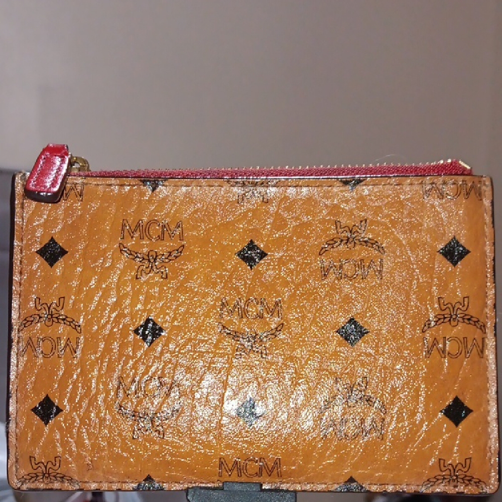 MCM Leather Visetos Monogram Cognac Pouch Featuring Red Zipper/Interior